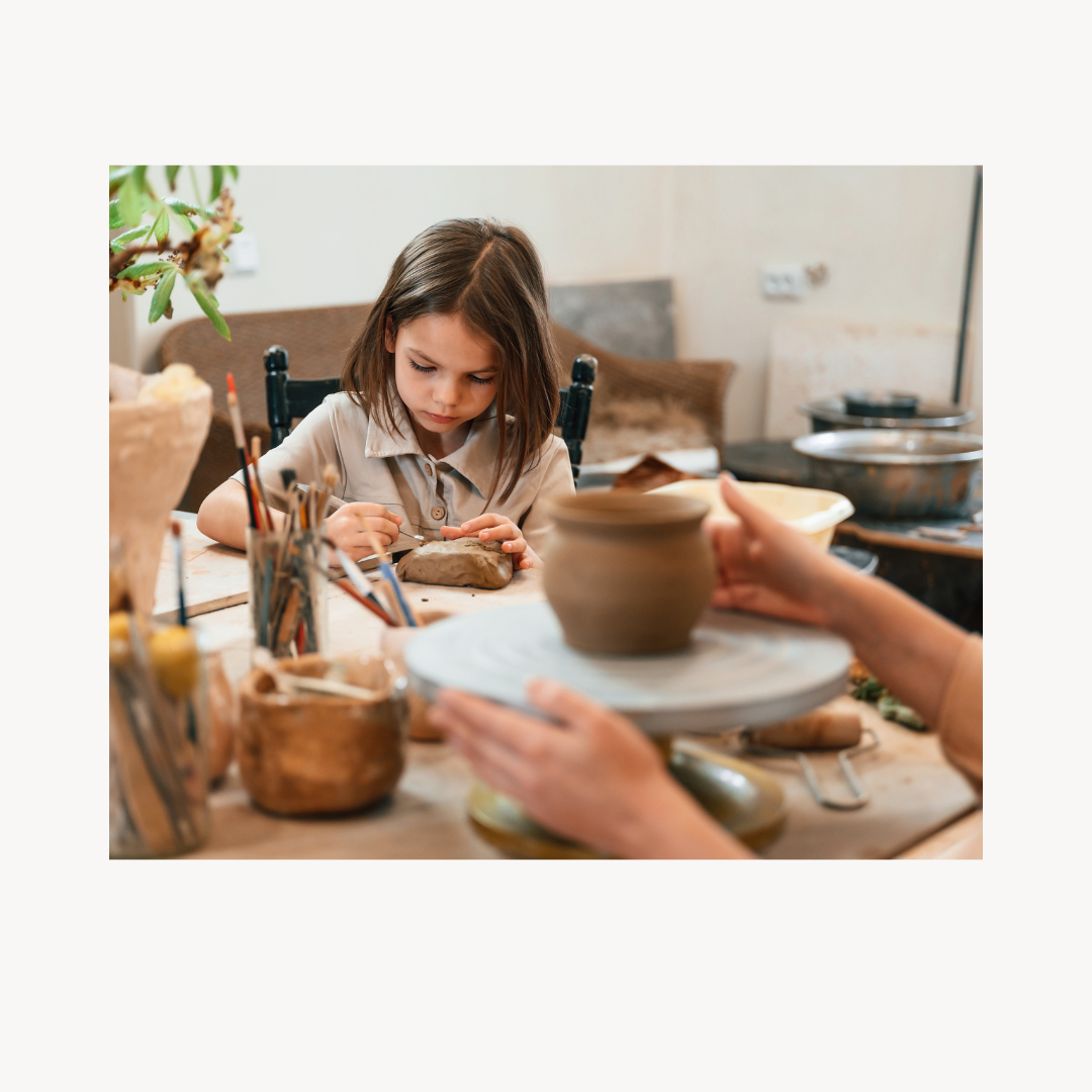 child making pottery